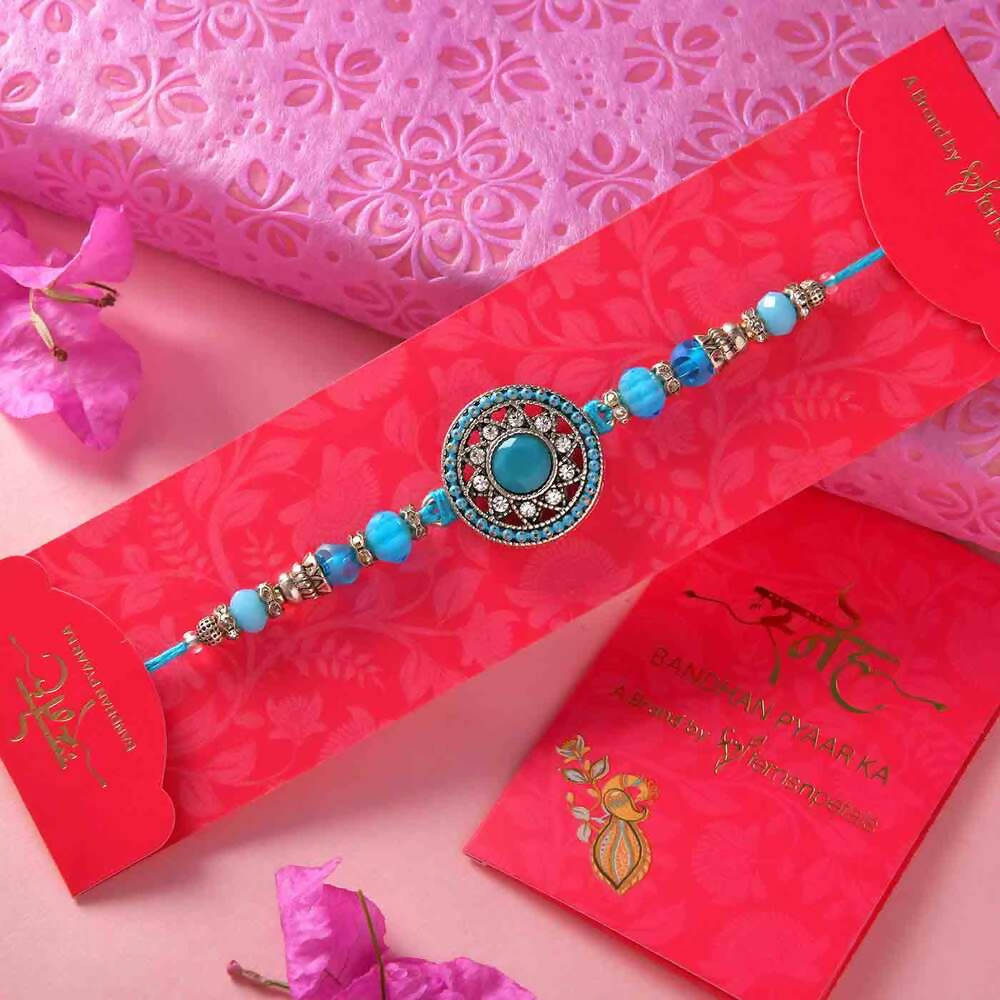 Sea Blue Beads & Stones Rakhi With Kaju Anjeer Barfi Combo