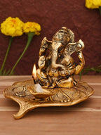 CraftVatika Gold Toned Aluminium Ganesh with Diya Idol